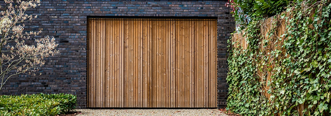 Amarr Traditional Garage Doors Tracks Repair in Miami Gardens, Florida