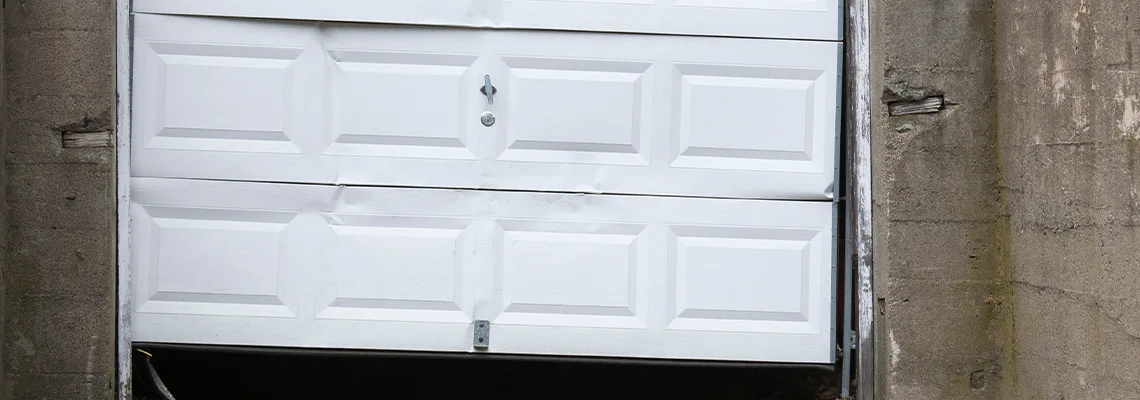 Garage Door Got Hit By A Car Dent Removal in Miami Gardens, FL