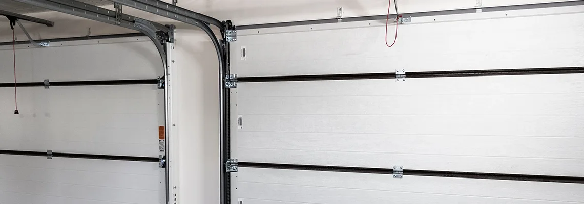 Fix Folding Garage Door Jerking in Miami Gardens, Florida