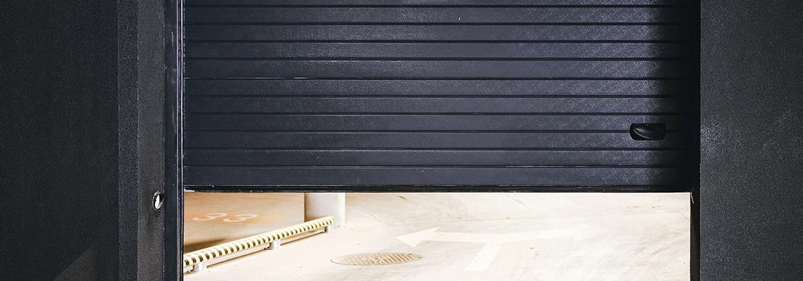 Residential Black Garage Door Installation in Miami Gardens, FL