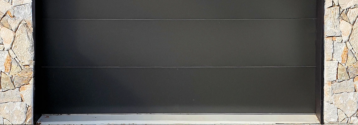 Overhead Black Garage Door Installation in Miami Gardens, Florida