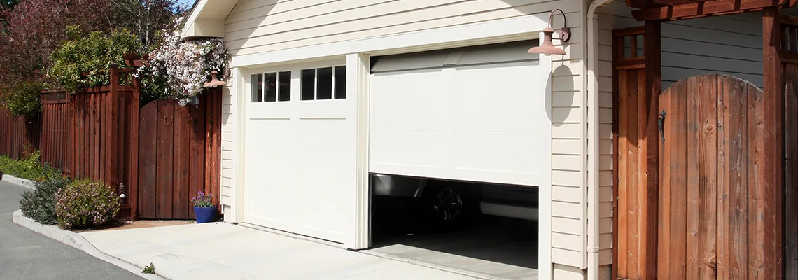 Fix Metal Garage Door Jerking in Miami Gardens